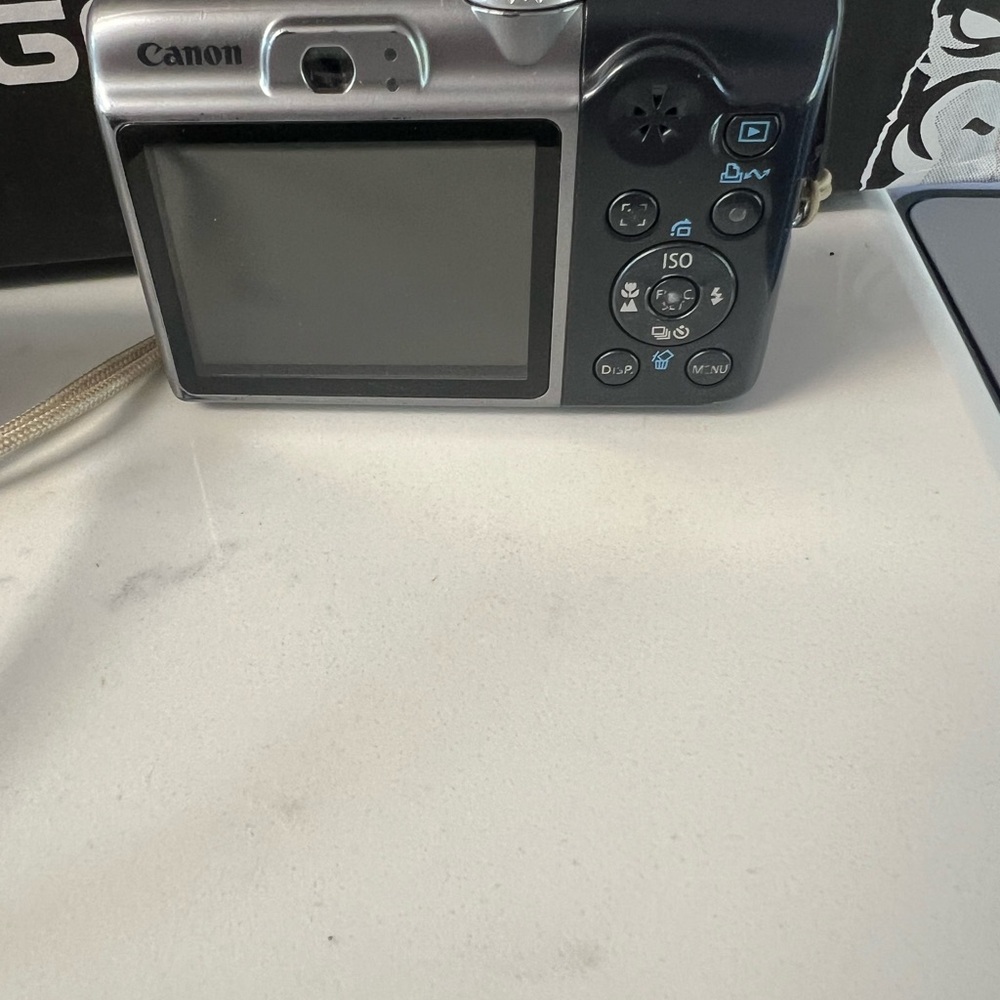 Canon Compact Camera in Metallic Silver and Black